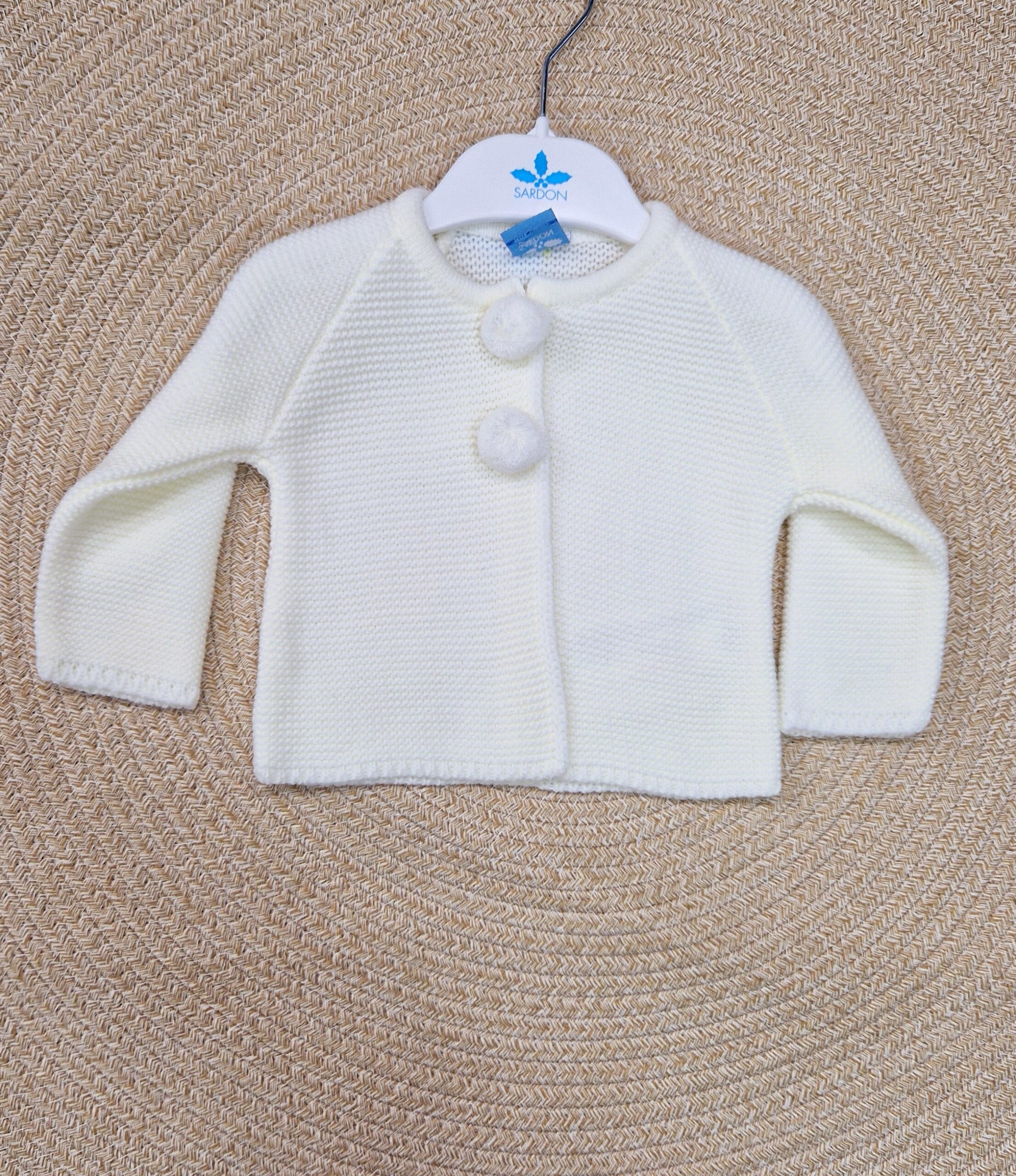 Sardon
Cardigan panna in pura lana art.024MA-250 - immagine 2