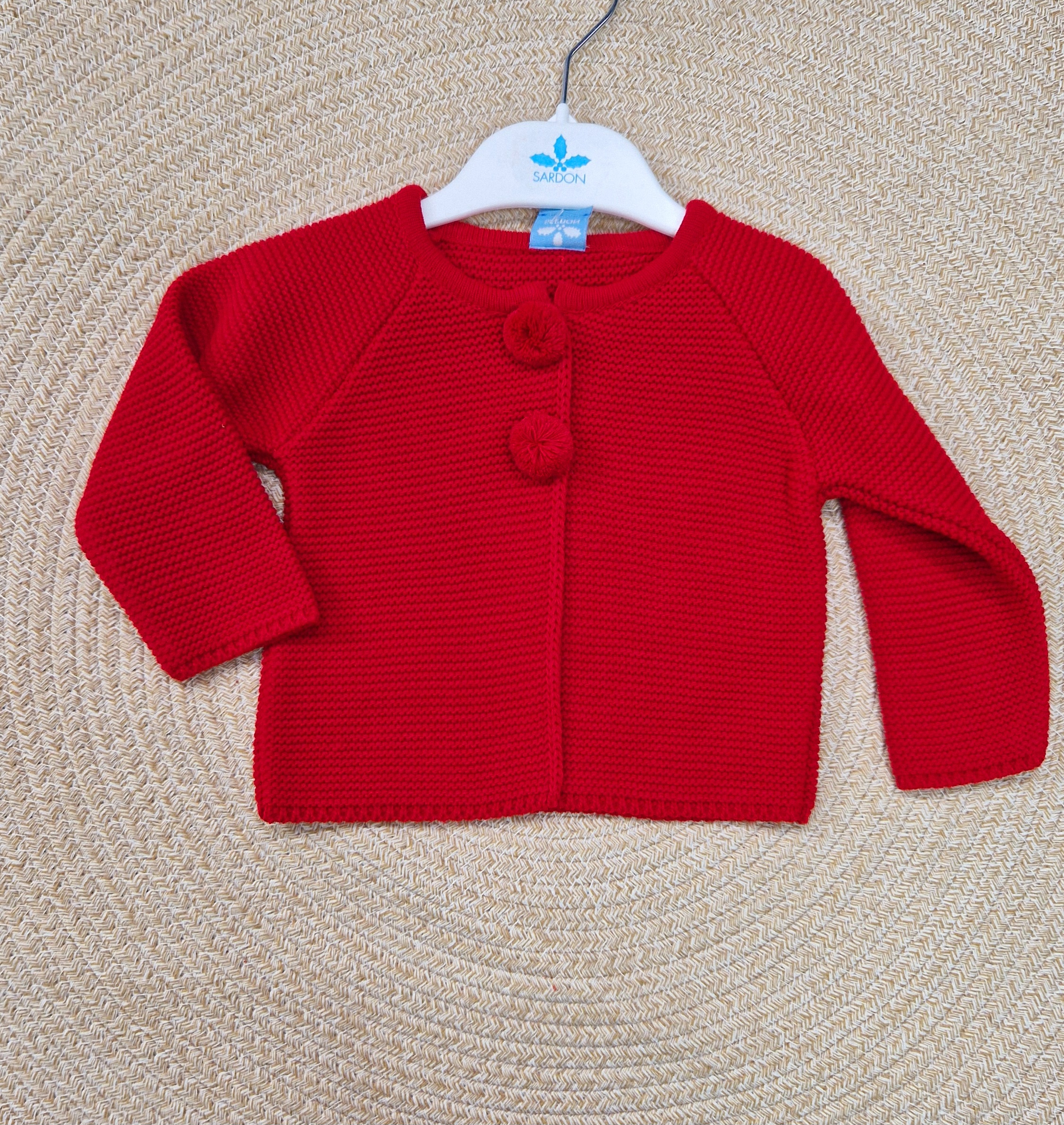 Sardon
Cardigan rosso in pura lana con pon pon art.MA-250 - immagine 2