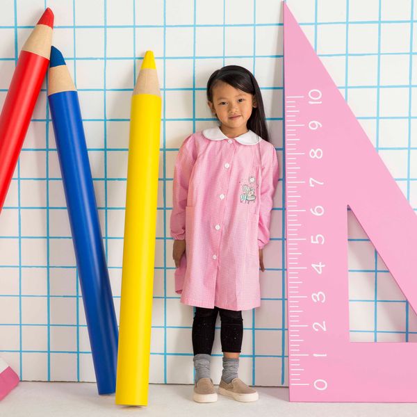 Grembiule bimba quadrettato rosa